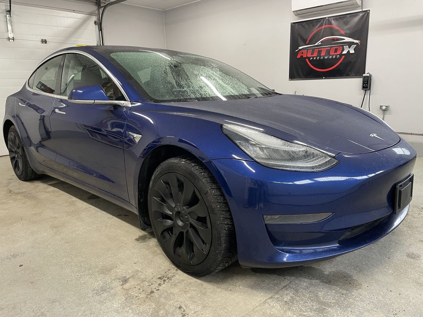 2020 Tesla Model 3 Standard Range Plus, front three-quarter view